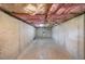 Unfinished basement with concrete walls, exposed insulation, and utilities at 1057 Cotton Oak Dr, Lawrenceville, GA 30045