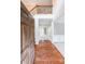 Inviting foyer with hardwood floors, a staircase with rod iron railing, and neutral paint at 1057 Cotton Oak Dr, Lawrenceville, GA 30045