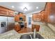 Kitchen with granite counters, stainless steel appliances, and custom cabinets at 1057 Cotton Oak Dr, Lawrenceville, GA 30045