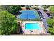 Aerial view showing community tennis courts and pool, offering recreational amenities for residents at 1807 N Chestnut Grove Dr, Marietta, GA 30066