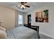 This bedroom features a comfortable bed, soft lighting, and unique wall art for a cozy retreat at 1807 N Chestnut Grove Dr, Marietta, GA 30066