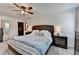 Comfortable bedroom featuring a tufted headboard bed and a neutral color palette at 1807 N Chestnut Grove Dr, Marietta, GA 30066