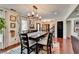 Spacious dining area showcasing hardwood floors, modern lighting, and stylish decor at 1807 N Chestnut Grove Dr, Marietta, GA 30066
