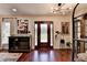 Inviting foyer showcasing hardwood floors, contemporary lighting, decor, and front door at 1807 N Chestnut Grove Dr, Marietta, GA 30066