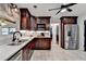 This home features a beautiful kitchen with stainless steel appliances and ample cabinet space at 1807 N Chestnut Grove Dr, Marietta, GA 30066