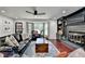 Bright living room with hardwood floors, fireplace, and a bay window offering an inviting space at 1807 N Chestnut Grove Dr, Marietta, GA 30066