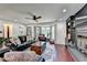 Cozy living room featuring hardwood floors, a fireplace, and a bay window with seating at 1807 N Chestnut Grove Dr, Marietta, GA 30066