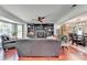 Bright living room with hardwood floors, fireplace with built-ins, and comfortable seating at 1807 N Chestnut Grove Dr, Marietta, GA 30066