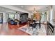 Spacious living and dining area featuring hardwood floors, built-ins, and ample natural light at 1807 N Chestnut Grove Dr, Marietta, GA 30066
