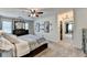 The main bedroom features a large bed, carpet flooring, and closet space at 1807 N Chestnut Grove Dr, Marietta, GA 30066