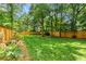Expansive backyard with lush lawn and privacy fence at 261 Ormond Se St, Atlanta, GA 30315