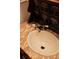 Close up of bathroom with marble counter and custom faucet at 261 Ormond Se St, Atlanta, GA 30315