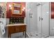 Bathroom features a glass shower, custom vanity, and marble counters at 261 Ormond Se St, Atlanta, GA 30315