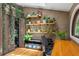 Home office with wood floors, built-in shelves, and laundry at 261 Ormond Se St, Atlanta, GA 30315