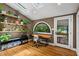 Home office with wood floors, built-in shelves, and natural light at 261 Ormond Se St, Atlanta, GA 30315