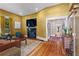Cozy living room with hardwood floors, fireplace, and comfortable seating area at 261 Ormond Se St, Atlanta, GA 30315