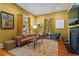 Charming living room featuring hardwood floors, a fireplace, and cozy seating at 261 Ormond Se St, Atlanta, GA 30315