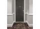 A gray apartment door with the number '706', framed by white trim, inviting entry to a private residence at 326 Roswell Se St # 706, Marietta, GA 30060