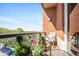 Cozy balcony with seating and plants, overlooking a parking area and trees, perfect for enjoying outdoor moments at 326 Roswell Se St # 706, Marietta, GA 30060