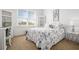 Sun-lit bedroom with carpet, built in bookshelves, desk and a large window view at 326 Roswell Se St # 706, Marietta, GA 30060