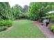 Well-maintained common lawn area with a grill and picnic table, perfect for outdoor gatherings at 326 Roswell Se St # 706, Marietta, GA 30060