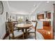 Open-concept living space with dining area, comfortable seating, and a modern kitchen for seamless entertaining at 326 Roswell Se St # 706, Marietta, GA 30060