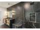 Beautiful bathroom featuring a luxurious shower, double sink vanity, and elegant marble tiling at 3711 Mountain Cove Rd, Snellville, GA 30039