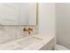 Bathroom features a white marble sink, gold faucet, and a geometric tile backsplash at 3711 Mountain Cove Rd, Snellville, GA 30039