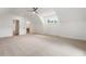 Bright bedroom with plush carpeting and an ensuite bathroom at 3711 Mountain Cove Rd, Snellville, GA 30039