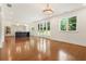 Open living space seamlessly connects living, dining, and kitchen areas for modern living at 3711 Mountain Cove Rd, Snellville, GA 30039