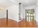 Open-concept living space with hardwood floors and neutral wall paint at 3711 Mountain Cove Rd, Snellville, GA 30039