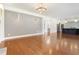 Bright, open-concept living space connects living room, kitchen, and dining areas at 3711 Mountain Cove Rd, Snellville, GA 30039