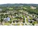 A scenic aerial view of the community showcasing homes, trees, streets at 5420 Stevehaven Ln, Cumming, GA 30028