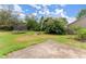Backyard with trampoline, lush landscaping and patio area at 5420 Stevehaven Ln, Cumming, GA 30028