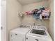 Laundry room equipped with a washing machine and dryer at 5420 Stevehaven Ln, Cumming, GA 30028