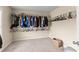Walk-in closet with custom shelving and ample storage space at 5420 Stevehaven Ln, Cumming, GA 30028