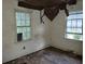Small bedroom with a bare floor and two bright windows awaiting personal customization at 1159 Eastridge Sw Rd, Atlanta, GA 30311