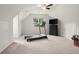 Bright bonus room features a treadmill, a TV, and a closet. Great for exercising at 1418 Mill Path Loop, Lawrenceville, GA 30045