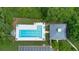 Aerial view showcasing the community pool, recreation space and surrounding green space at 1418 Mill Path Loop, Lawrenceville, GA 30045