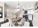 Stylish dining area featuring hardwood floors, a modern light fixture, and art accents at 164 Blakemore Dr, Smyrna, GA 30080