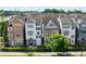 Charming townhomes with diverse architectural details line a well-manicured street at 164 Blakemore Dr, Smyrna, GA 30080