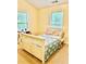 Comfortable bedroom with bright windows, natural light, and a neutral color scheme at 2691 Pointcrest Way, Grayson, GA 30017