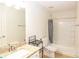 Bathroom featuring granite countertop vanity, tub, and shower at 620 River Mist Dr, Jonesboro, GA 30238