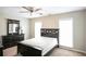 Bedroom with dark furniture, carpet flooring, and natural light at 620 River Mist Dr, Jonesboro, GA 30238
