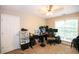 Bedroom featuring a ceiling fan and desk area at 620 River Mist Dr, Jonesboro, GA 30238