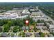 An aerial view of a suburban neighborhood near busy commercial districts and highways at 1282 Kendrick Ne Rd, Brookhaven, GA 30319