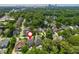 Aerial view of a residential neighborhood with mature trees and manicured lawns near the city skyline at 1282 Kendrick Ne Rd, Brookhaven, GA 30319