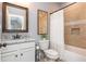 Charming bathroom featuring a vanity with granite countertops and tiled shower/tub combo at 1282 Kendrick Ne Rd, Brookhaven, GA 30319