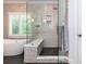 Modern bathroom featuring a luxurious shower, soaking tub, and designer tiles at 1282 Kendrick Ne Rd, Brookhaven, GA 30319