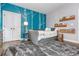 Inviting bedroom with a themed accent wall, comfortable rug, and ample natural light at 1282 Kendrick Ne Rd, Brookhaven, GA 30319